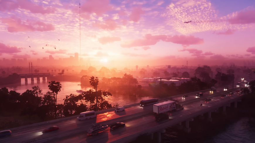 Grand Theft Auto VI: Nový termín a vše o nejočekávanější hře desetiletí (aktualizováno) Záběr na silnici s auty a východ slunce, screenshot z traileru na hru GTA VI